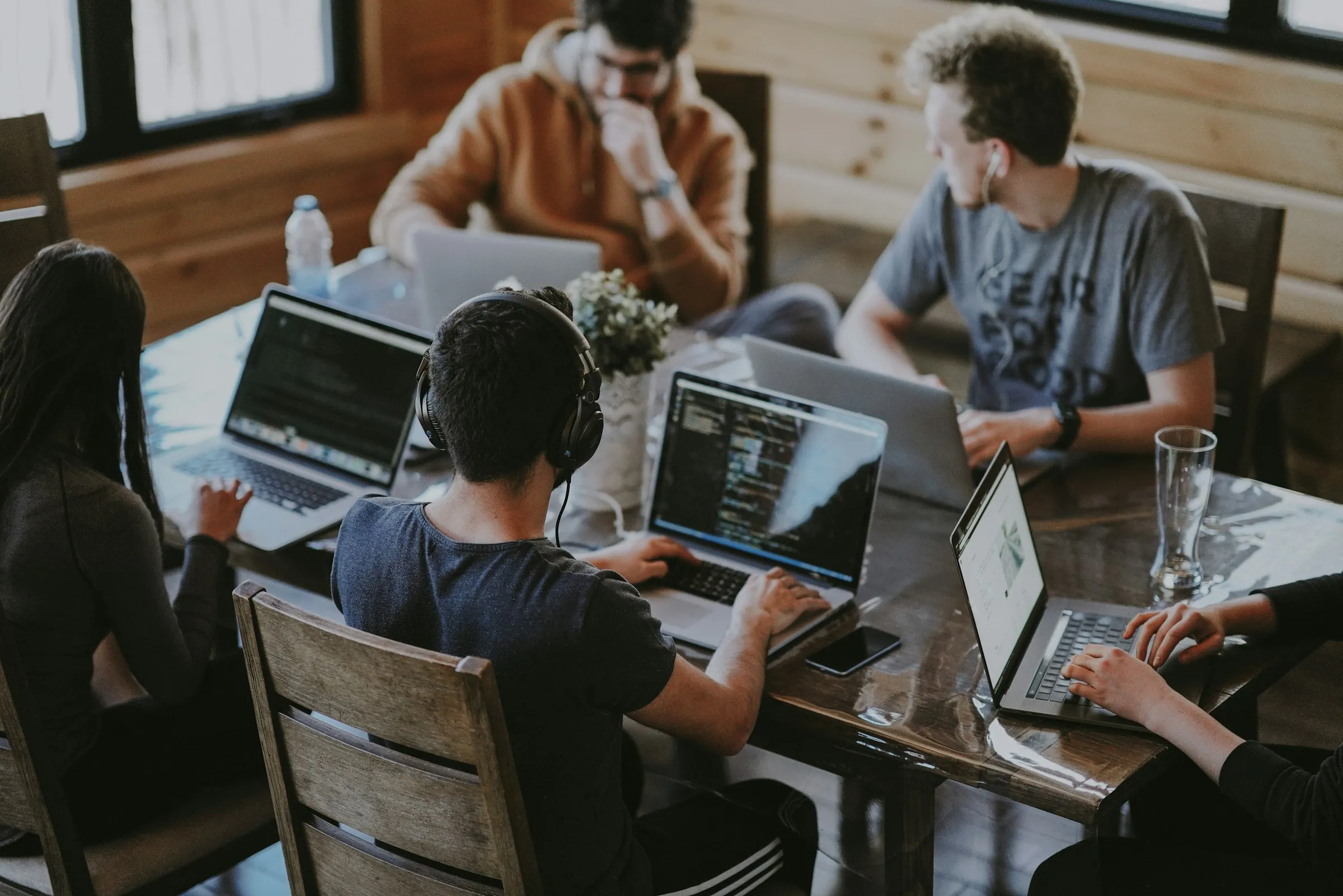 Business travellers working on laptops