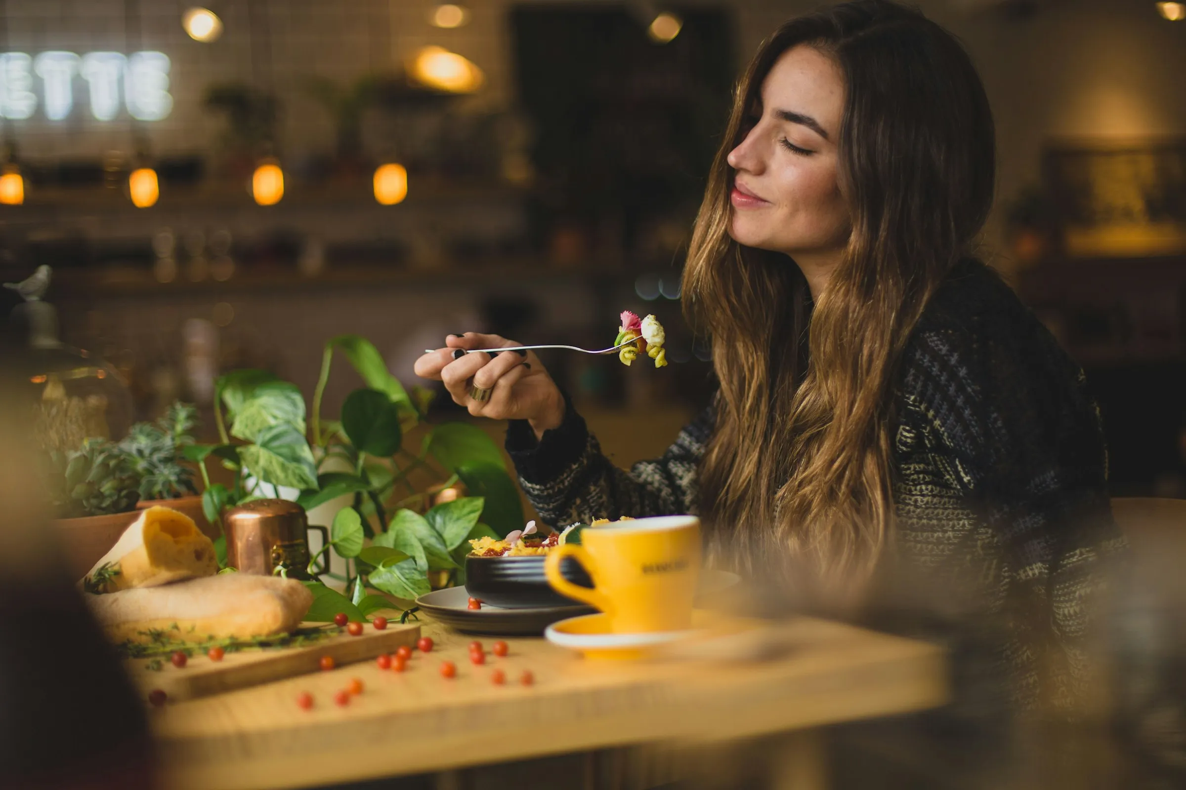 A guest enjoying a meal at a hotel restaurant